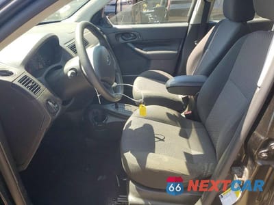 Zdjęcie 7 z 12 samochodu: 2007 FORD FOCUS ZX5 VIN:1FAHP37N57W306691 - miniatura