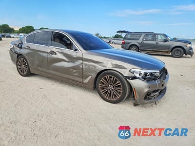 Czwarte zdjęcie samochodu z boku: 2018 BMW 530 I VIN:WBAJA5C55JWA38215 - miniatura