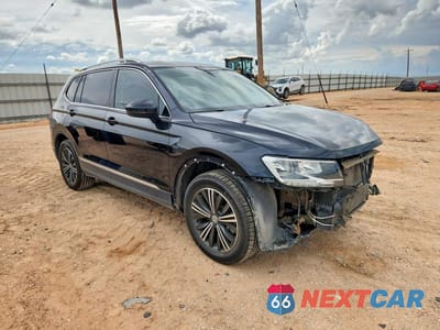 Czwarte zdjęcie samochodu z boku: 2019 VOLKSWAGEN TIGUAN SE VIN:3VV2B7AX6KM029611 - miniatura