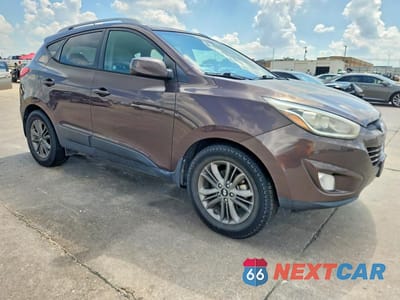 Czwarte zdjęcie samochodu z boku: 2014 HYUNDAI TUCSON SE VIN:KM8JU3AG6EU845193 - miniatura