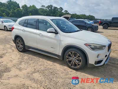 Czwarte zdjęcie samochodu z boku: 2016 BMW X1 XDRIVE28I VIN:WBXHT3C37GP881723 - miniatura