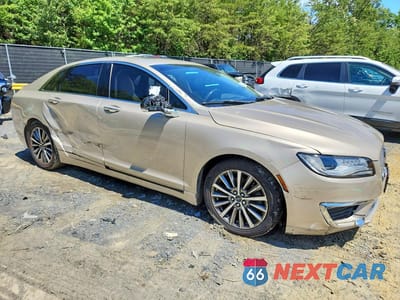 Czwarte zdjęcie samochodu z boku: 2017 LINCOLN MKZ SELECT VIN:3LN6L5C94HR608068 - miniatura
