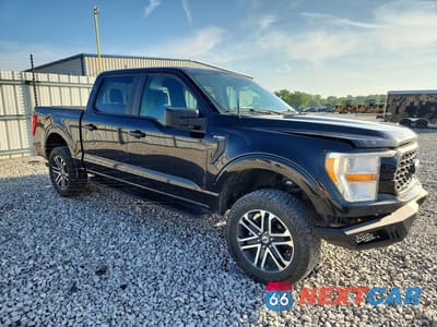 Czwarte zdjęcie samochodu z boku: 2022 FORD F150 SUPERCREW VIN:1FTFW1E55NKE95410 - miniatura