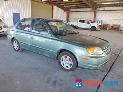 Czwarte zdjęcie samochodu z boku: 2005 HYUNDAI ACCENT GL VIN:KMHCG45C85U605365 - miniatura