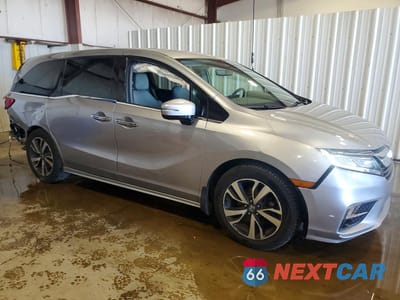 Czwarte zdjęcie samochodu z boku: 2018 HONDA ODYSSEY ELITE VIN:5FNRL6H9XJB099501 - miniatura