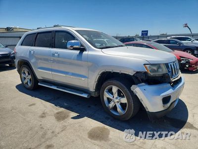 Czwarte zdjęcie samochodu z boku: 2013 JEEP GRAND CHEROKEE LIMITED VIN:1C4RJEBT7DC558537 - miniatura