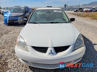 Piąte zdjęcie samochodu w środku: 2004 MITSUBISHI LANCER ES VIN:JA3AJ26E24U066742 - miniatura