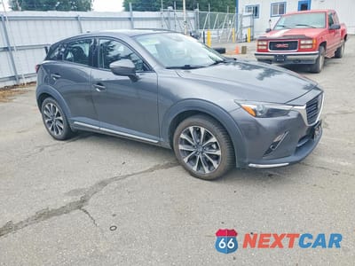 Czwarte zdjęcie samochodu z boku: 2019 MAZDA CX-3 GRAND TOURING VIN:JM1DKFD77K0434036 - miniatura