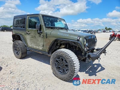 Czwarte zdjęcie samochodu z boku: 2016 JEEP WRANGLER SPORT VIN:1C4AJWAG8GL137258 - miniatura
