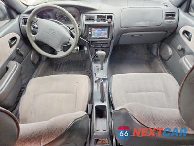 Zdjęcie 8 z 12 samochodu: 1997 TOYOTA COROLLA BASE VIN:1NXBA02E1VZ561978 - miniatura