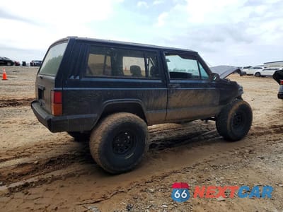 Trzecie zdjęcie samochodu z tyłu: 1994 JEEP CHEROKEE SPORT VIN:1J4FT67S6RL130866 - miniatura