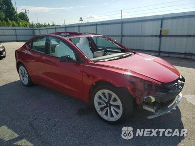 Czwarte zdjęcie samochodu z boku: 2022 TESLA MODEL 3 VIN:5YJ3E1EA2NF347098 - miniatura