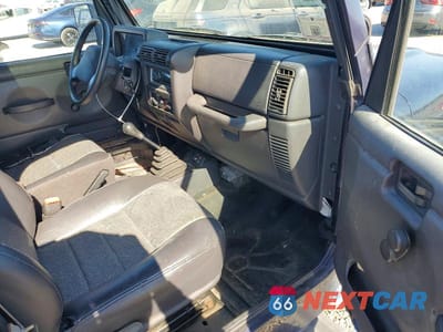 Zdjęcie 8 z 12 samochodu: 1999 JEEP WRANGLER VIN:1J4FY29P2XP472503 - miniatura