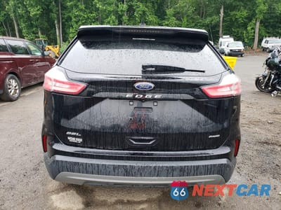 Zdjęcie 6 z 13 samochodu: 2023 FORD EDGE SEL VIN:2FMPK4J92PBA25256 - miniatura