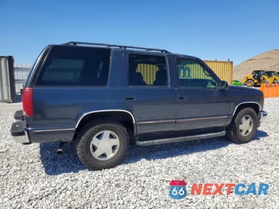 Trzecie zdjęcie samochodu z tyłu: 1997 GMC YUKON VIN:1GKEK13R9VJ754729 - miniatura