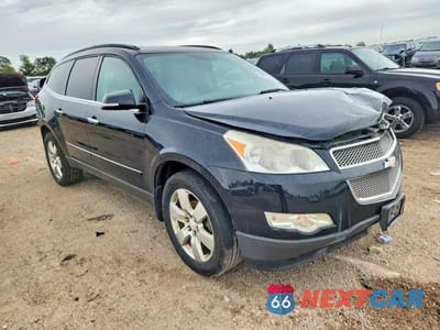 Czwarte zdjęcie samochodu z boku: 2011 CHEVROLET TRAVERSE LTZ VIN:1GNKVLED9BJ312930 - miniatura