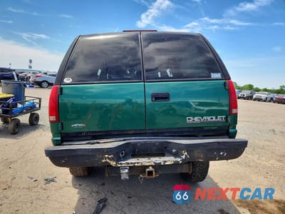 Zdjęcie 6 z 12 samochodu: 1999 CHEVROLET SUBURBAN K1500 VIN:3GNFK16R2XG199002 - miniatura