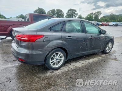 Trzecie zdjęcie samochodu z tyłu: 2015 FORD FOCUS SE VIN:1FADP3F20FL318334 - miniatura