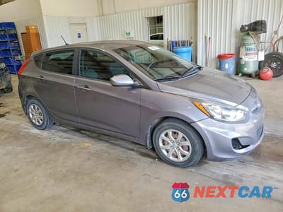 Czwarte zdjęcie samochodu z boku: 2014 HYUNDAI ACCENT GS VIN:KMHCT5AE0EU180846 - miniatura