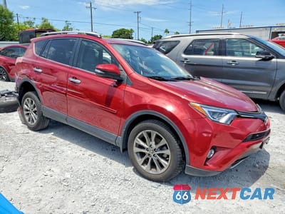Czwarte zdjęcie samochodu z boku: 2018 TOYOTA RAV4 LIMITED VIN:JTMDFREV0JD242094 - miniatura