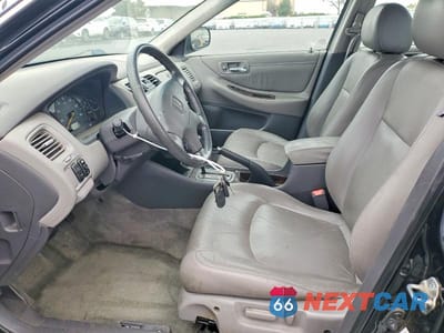 Zdjęcie 7 z 12 samochodu: 2002 HONDA ACCORD EX VIN:1HGCG16502A023052 - miniatura