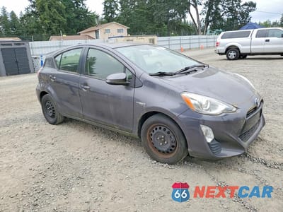 Czwarte zdjęcie samochodu z boku: 2016 TOYOTA PRIUS C TWO VIN:JTDKDTB35G1133069 - miniatura