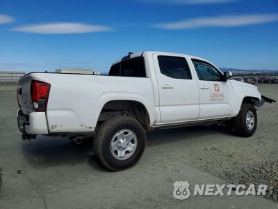 Trzecie zdjęcie samochodu z tyłu: 2019 TOYOTA TACOMA SR V6 VIN:3TMCZ5AN2KM197165 - miniatura