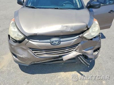 Zdjęcie 12 z 13 samochodu: 2011 HYUNDAI TUCSON GL VIN:KM8JT3AB6BU150408 - miniatura