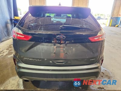 Zdjęcie 6 z 13 samochodu: 2022 FORD EDGE TITANIUM VIN:2FMPK4K93NBA14083 - miniatura