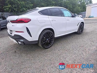 Czwarte zdjęcie samochodu z boku: 2027 BMW X6 XDRIVE40I VIN:5UX33EX0XV9428831 - miniatura