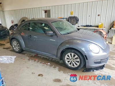 Czwarte zdjęcie samochodu z boku: 2016 VOLKSWAGEN BEETLE 1.8T VIN:3VWF17AT8GM602187 - miniatura