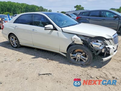 Czwarte zdjęcie samochodu z boku: 2011 MERCEDES-BENZ E 350 4MATIC VIN:WDDHF8HBXBA318832 - miniatura