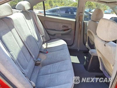 Zdjęcie 10 z 12 samochodu: 2004 HYUNDAI ELANTRA GLS/GT VIN:KMHDN46DX4U909507 - miniatura