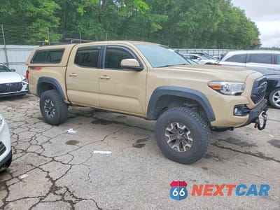 Czwarte zdjęcie samochodu z boku: 2017 TOYOTA TACOMA TRD OFF-ROAD VIN:5TFCZ5AN1HX103859 - miniatura