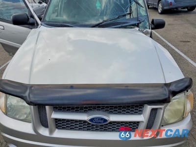 Zdjęcie 11 z 12 samochodu: 2005 FORD EXPLORER SPORT TRAC VIN:1FMZU77KX5UB74651 - miniatura