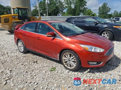 Czwarte zdjęcie samochodu z boku: 2018 FORD FOCUS TITANIUM VIN:1FADP3J22JL283120 - miniatura