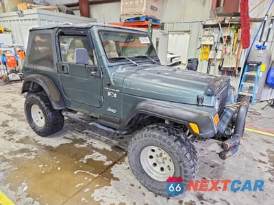 Czwarte zdjęcie samochodu z boku: 2002 JEEP WRANGLER / TJ X VIN:1J4FA39S72P708845 - miniatura