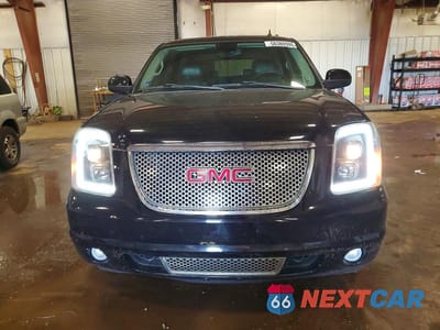 Piąte zdjęcie samochodu w środku: 2011 GMC YUKON DENALI VIN:1GKS2EEF3BR106605 - miniatura