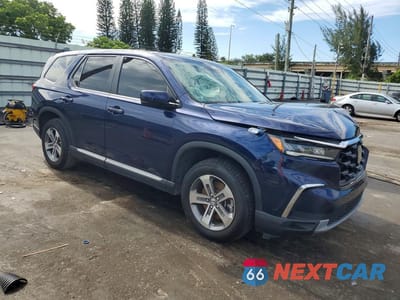 Czwarte zdjęcie samochodu z boku: 2024 HONDA PILOT EXL VIN:5FNYG2H41RB016398 - miniatura