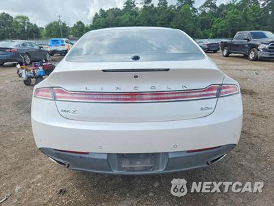 Zdjęcie 6 z 12 samochodu: 2015 LINCOLN MKZ HYBRID VIN:3LN6L2LU2FR618369 - miniatura