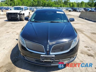 Piąte zdjęcie samochodu w środku: 2016 LINCOLN MKS VIN:1LNHL9EK9GG603194 - miniatura