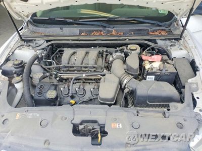 Zdjęcie 11 z 12 samochodu: 2014 FORD TAURUS SE VIN:1FAHP2D88EG147519 - miniatura