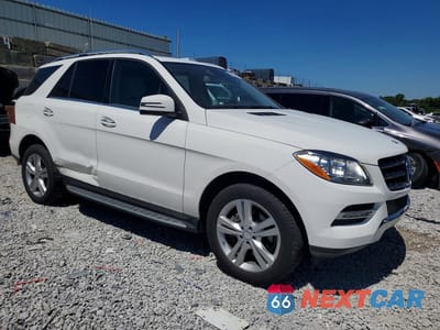 Czwarte zdjęcie samochodu z boku: 2015 MERCEDES-BENZ ML 350 4MATIC VIN:4JGDA5HB5FA441185 - miniatura