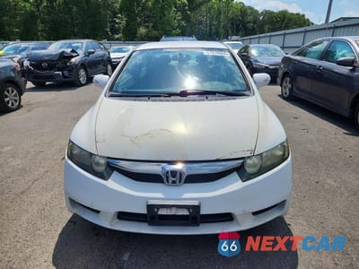 Piąte zdjęcie samochodu w środku: 2011 HONDA CIVIC HYBRID VIN:JHMFA3F21BS000404 - miniatura