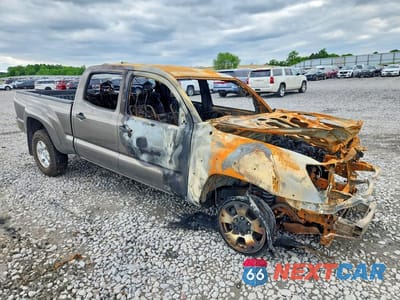 Czwarte zdjęcie samochodu z boku: 2015 TOYOTA TACOMA DOUBLE CAB LONG BED VIN:3TMMU4FN2FM077507 - miniatura
