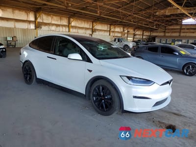 Czwarte zdjęcie samochodu z boku: 2023 TESLA MODEL X VIN:7SAXCBE51PF385766 - miniatura