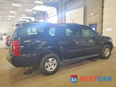 Trzecie zdjęcie samochodu z tyłu: 2012 CHEVROLET SUBURBAN K1500 LT VIN:1GNSKJE77CR103289 - miniatura