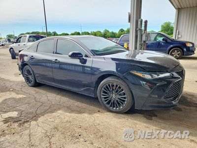 Czwarte zdjęcie samochodu z boku: 2019 TOYOTA AVALON HYBRID XSE VIN:4T1B21FB4KU001600 - miniatura