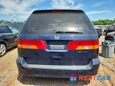 Zdjęcie 6 z 13 samochodu: 2004 HONDA ODYSSEY EXL VIN:2HKRL18984H500004 - miniatura