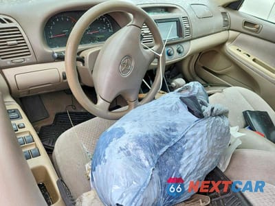 Zdjęcie 8 z 11 samochodu: 2004 TOYOTA CAMRY LE VIN:4T1BE32K14U307598 - miniatura